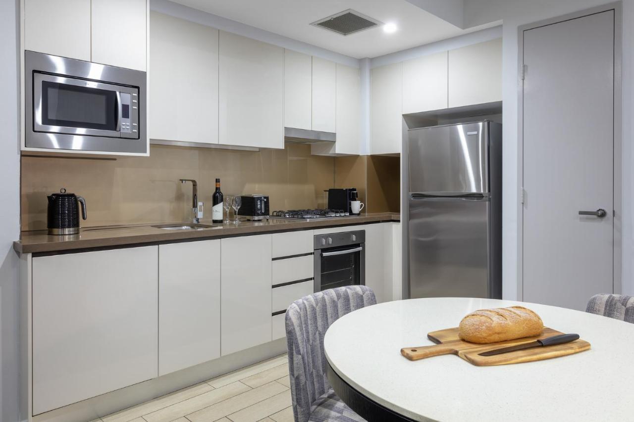 Meriton Suites North Ryde Sydney Exteriér fotografie A typical kitchen in a residential apartment